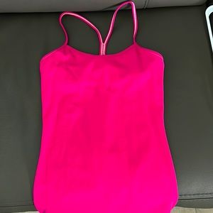 Lululemon pink tank. Brand new without tags. Size 4